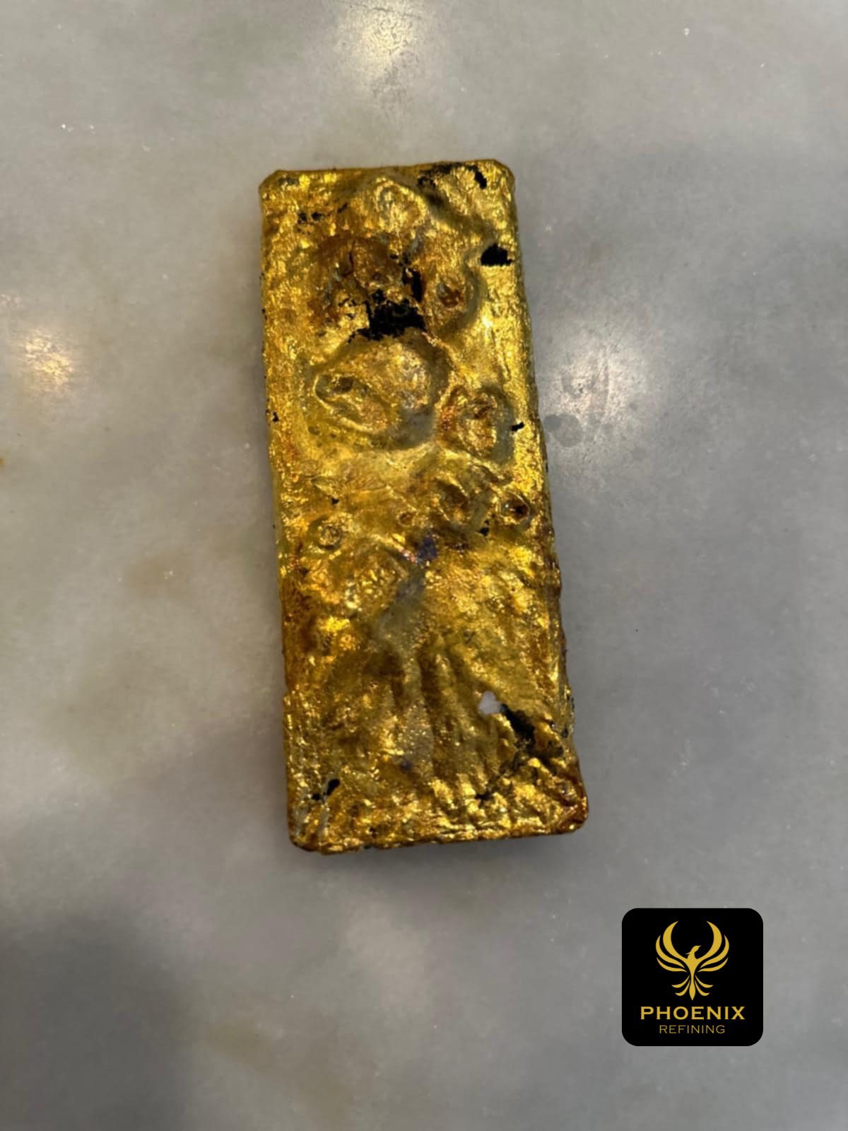 Close-up of a rough gold bar