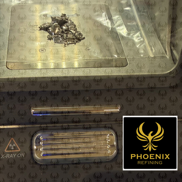 Metal sample inside an XRF analyzer chamber