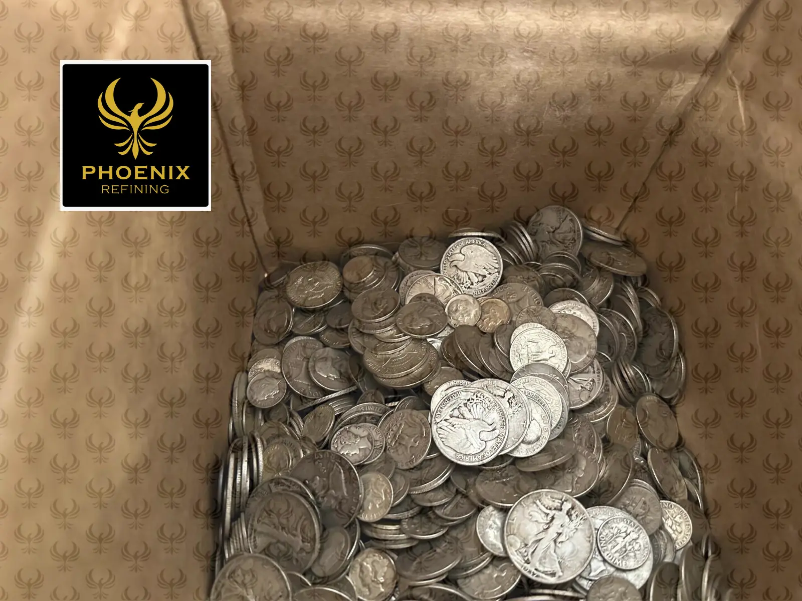 Box of silver coins for refining